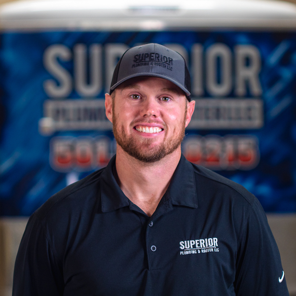 Master Plumber Dustin Smith in a Superior Plumbing & Rooter LLC black polo and gray hat.